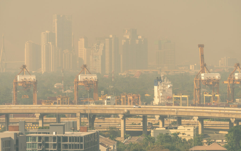 Cityscape with polluted air. Air pollution. Smog and fine dust 